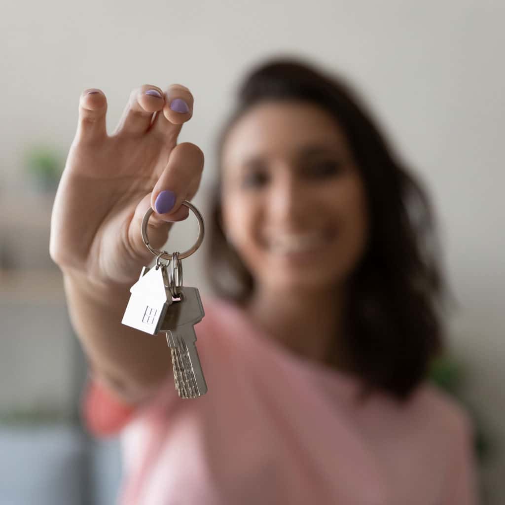 contents woman holding keys